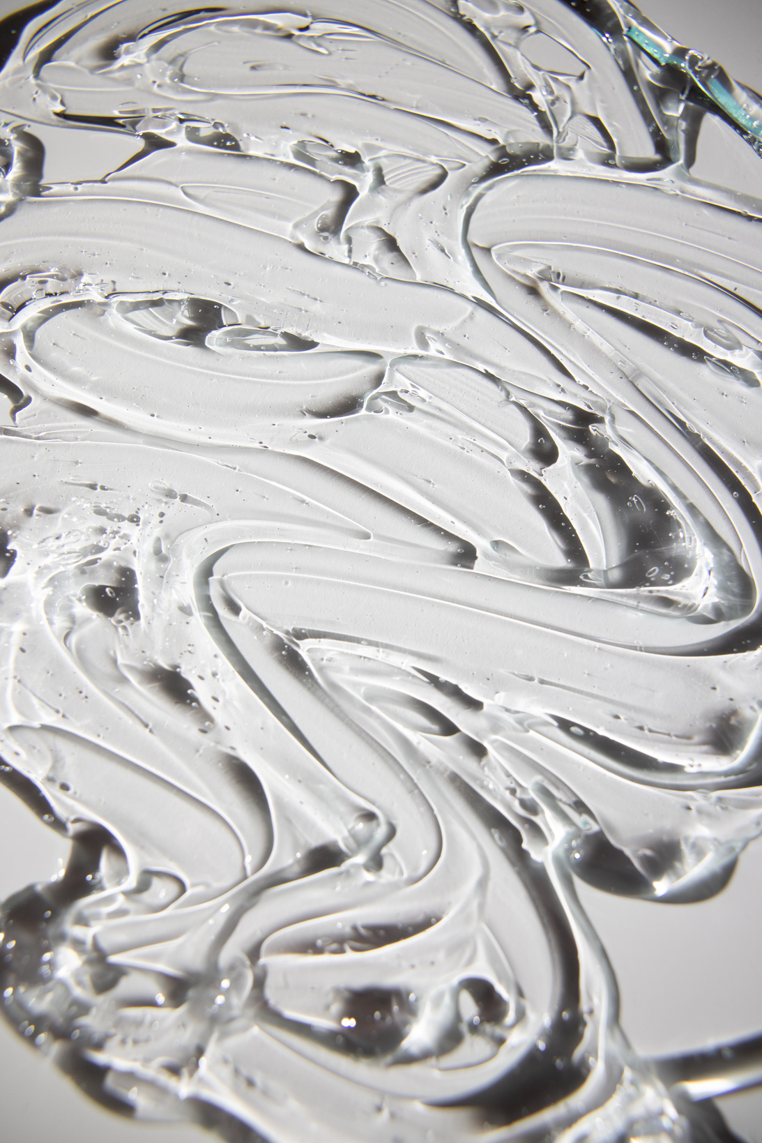 Abstract background of wavy gel fluids with smooth texture